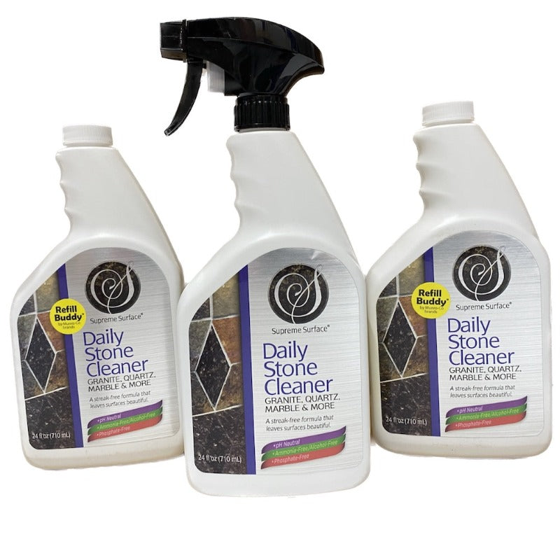Supreme Surface Daily Stone Cleaner for Granite Quartz Marble and More. This image showes (1) 24 fl oz bottle with trigger sprayer and (2) Daily Stone Cleaner Refills, for cleaning quartz countertops, honed, polished, or textured granite and marble.