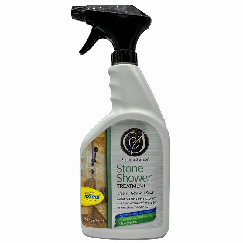 This image features one bottle of Munro-Co Brands Supreme Surface Stone Shower Cleaner and Conditioning Treatment, 24 fl oz bottle with trigger sprayer. Here's what the front label says: Stone Shower Treatment clean revive seal. Beautifies and protects polished, honed and tumbled travertine, marble, limestone and other calcareous natural stones. Environmentally safe formula, ammonia-free, alcohol-free, biodegradable